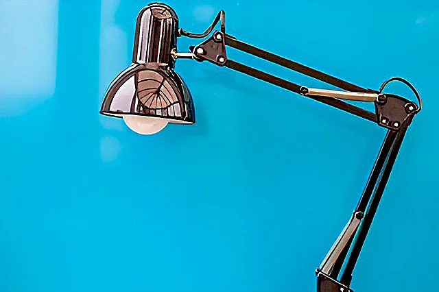 Anglepoise Lamp in blue background